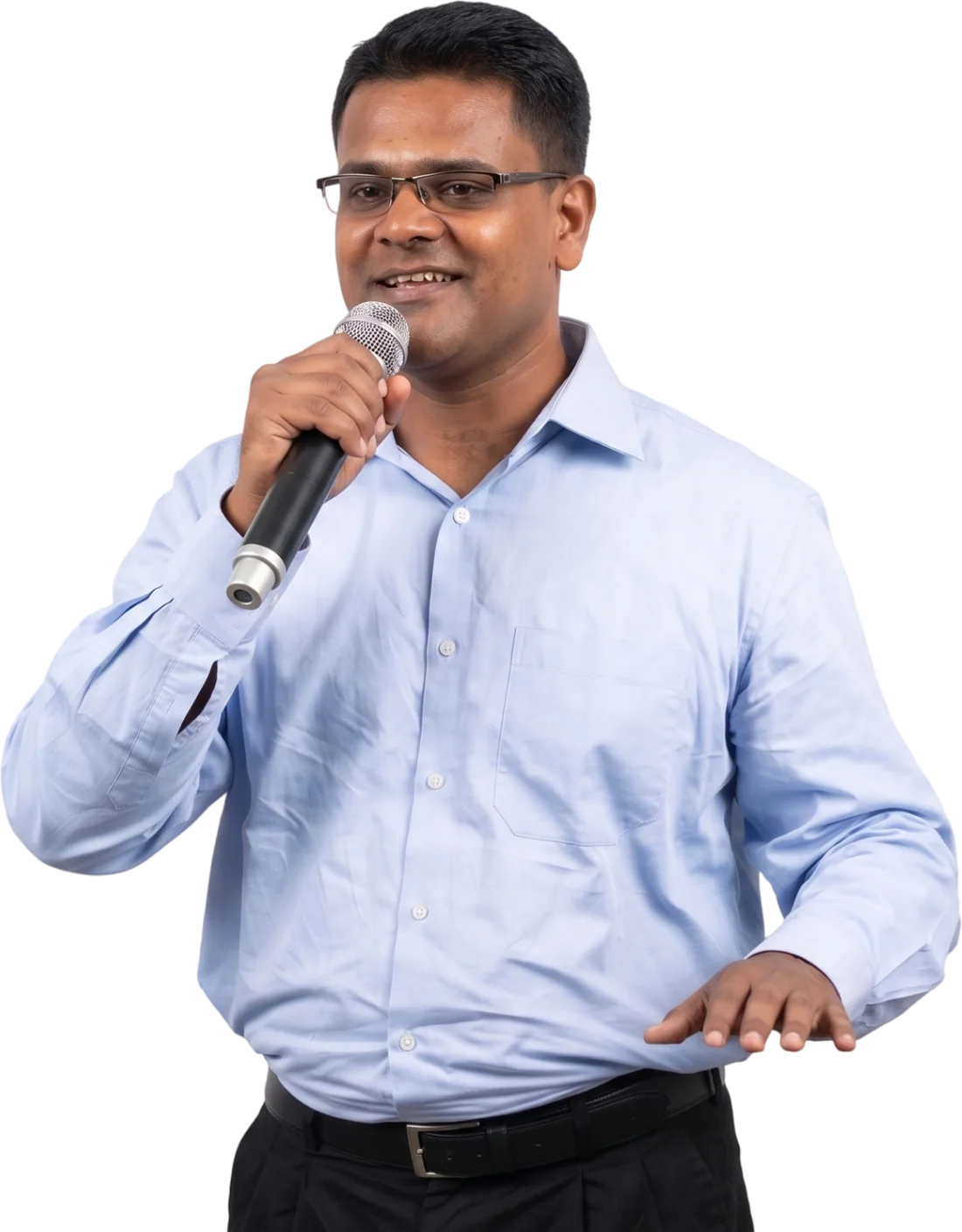 Saji Mathews speaking with a microphone